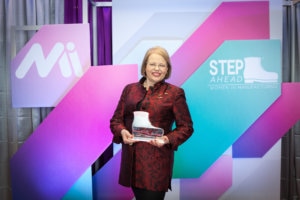 Hannah Kain receiving Step Ahead Award